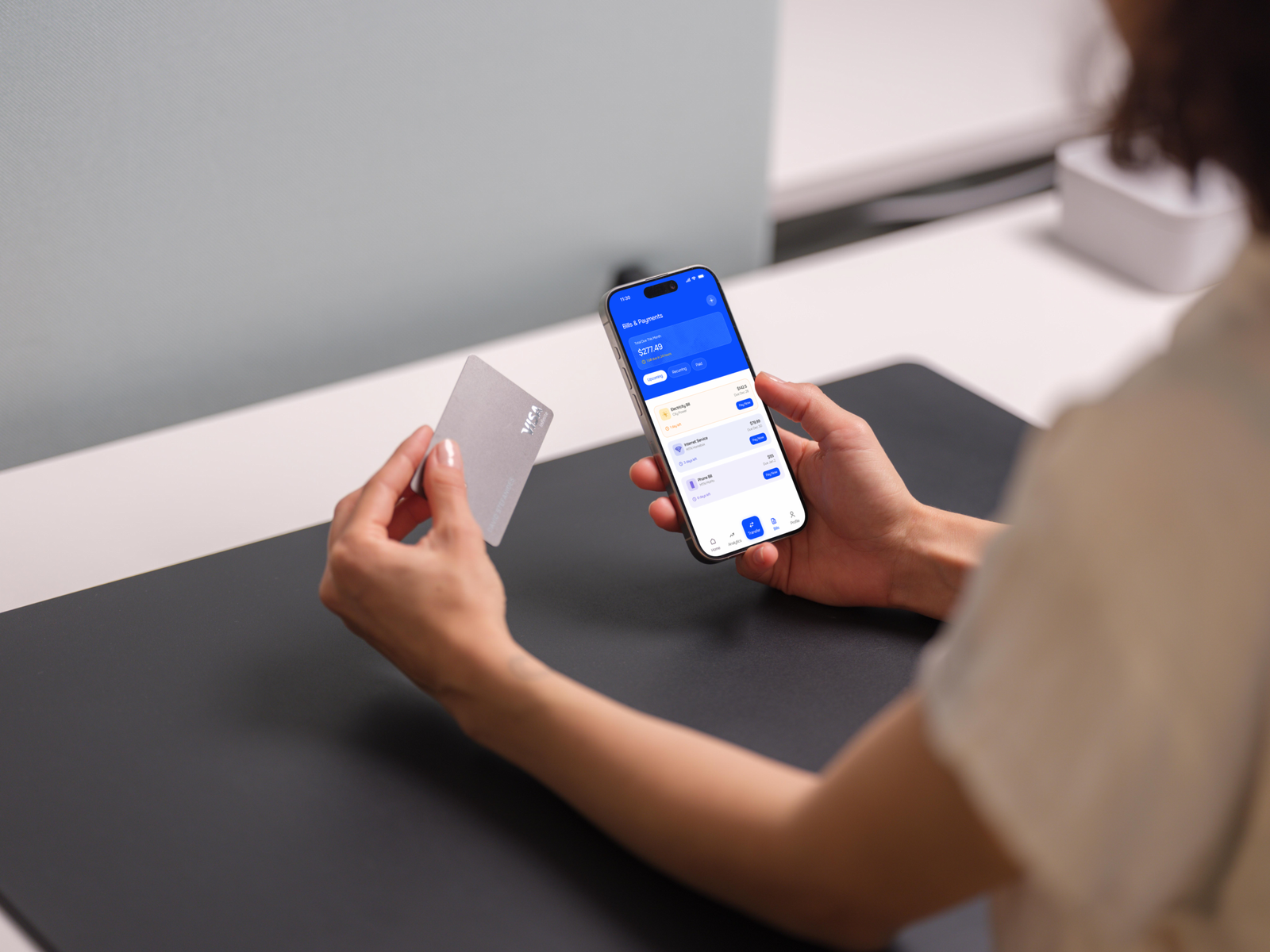 Free iPhone 15 Pro mockup with credit card in hand Mockuuups Studio scaled